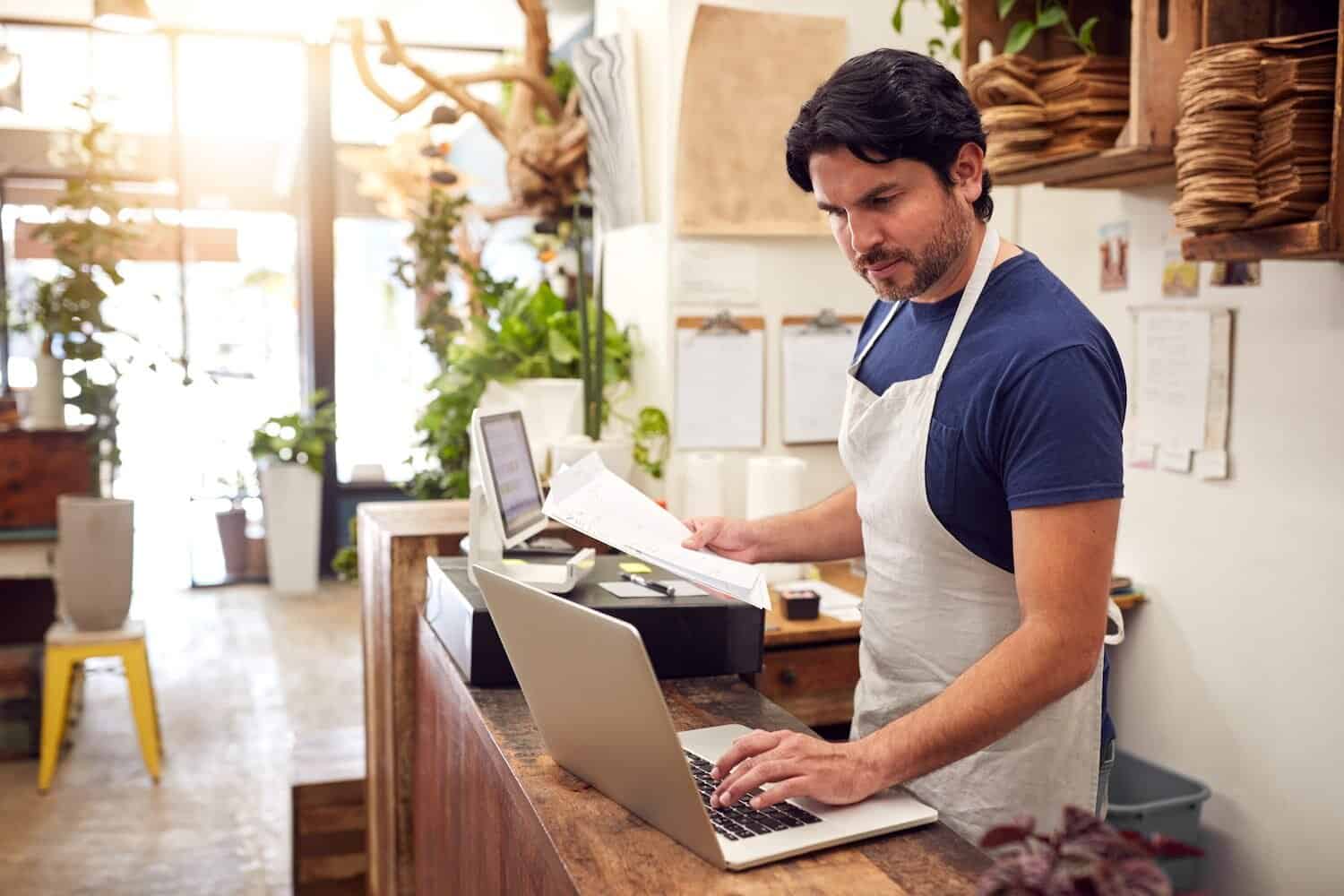 Business owner reviewing sales